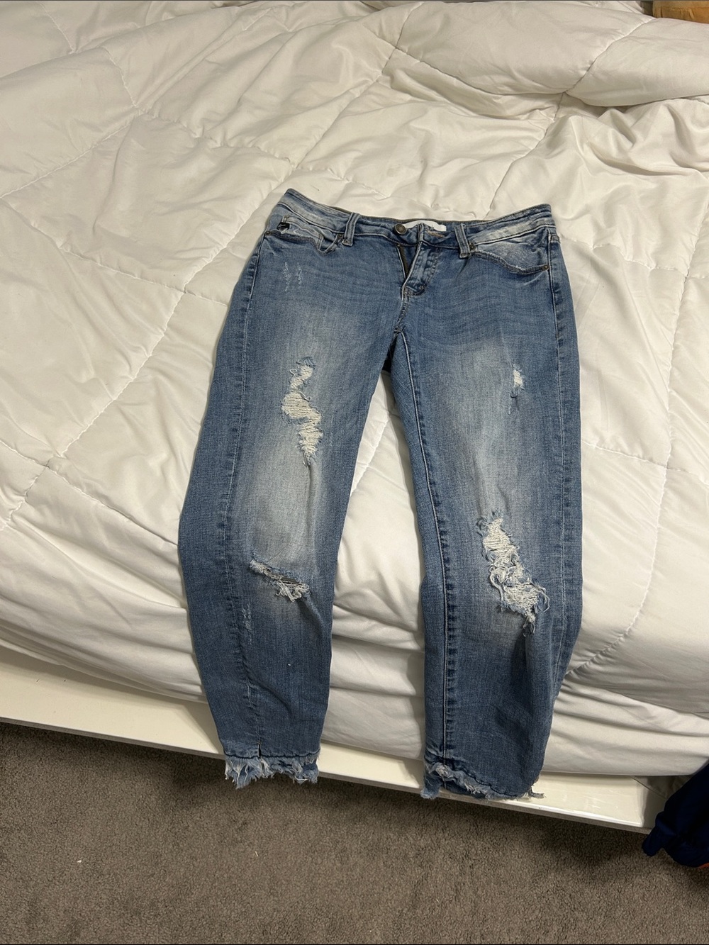 Women's Distressed Light Blue Jeans